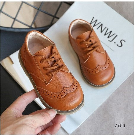 Zapatos para niños elegantes cintas